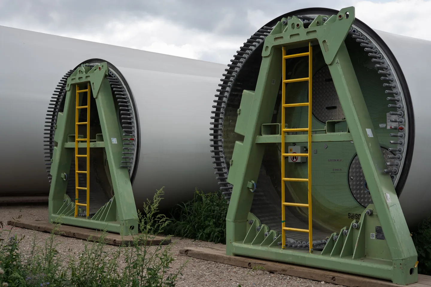 Wind turbine blades racked in a yard