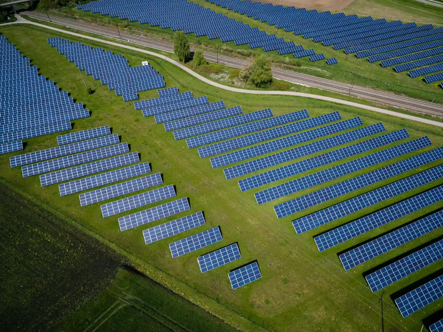 Aerial view of a solar farm laid out in rows